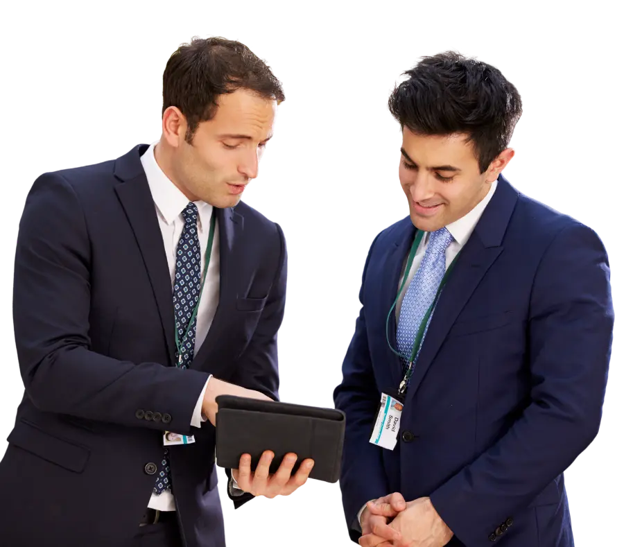 Two men looking at plans